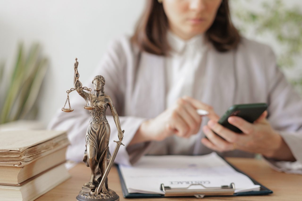 Statuette of the goddess of justice a symbol of honesty and decency legal services and assistance.jpg